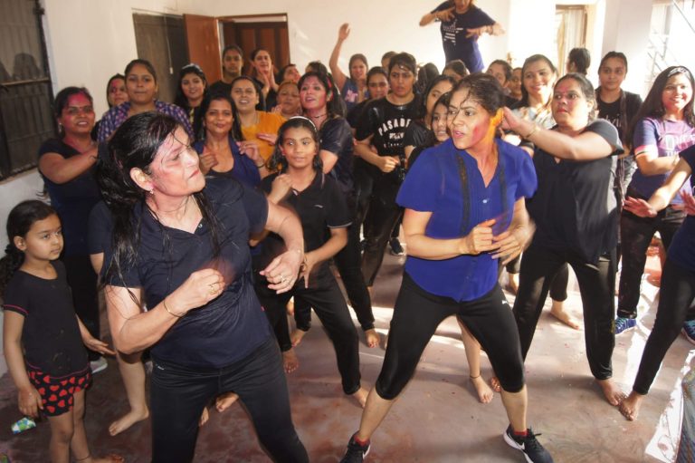 Women Holi dancing celebration in kardioqueens studio